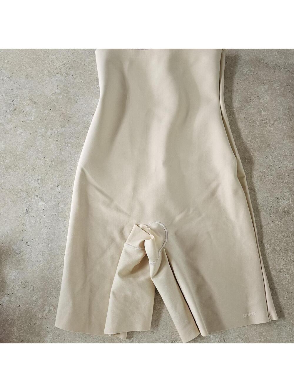 SKIMS High Waisted Short in color Sand sz L